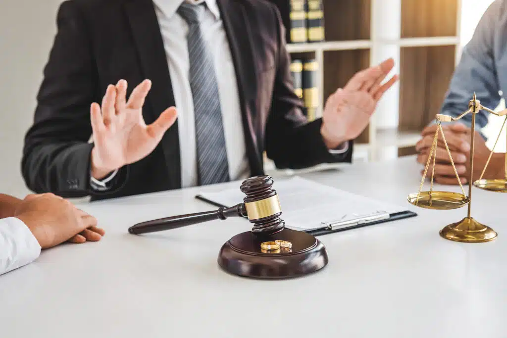 Paternity lawyer reviewing DNA test documents with a client.